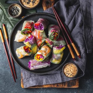 Sliced-Fresh-Rice-Paper-Rolls-with-Vegetables-and-Spicy-Carrot-Dipping-Sauce